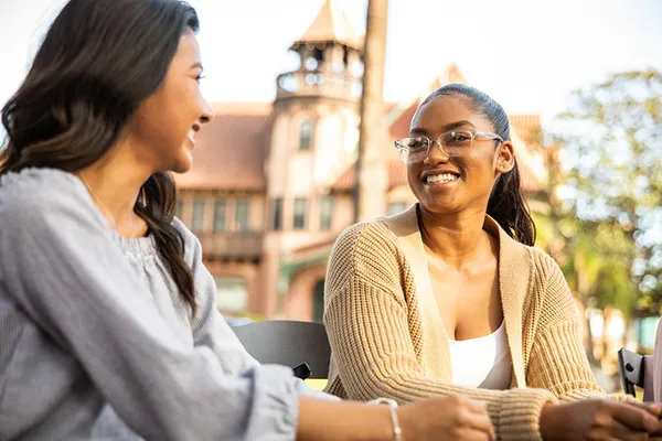 Two students talking to each other