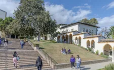 Students walking at the stairs of the Chalon Campus