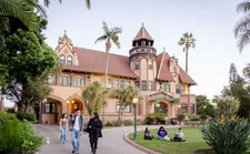 Students walking in front of the mansion which sits at the center of MSMU's Doheny campus.