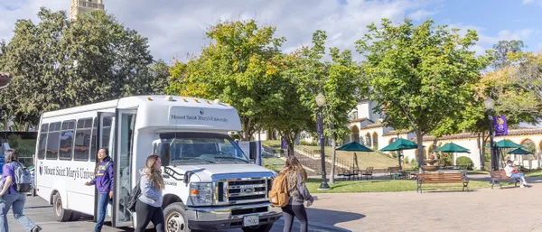 Students exciting the shuttle at the Chalon Campus