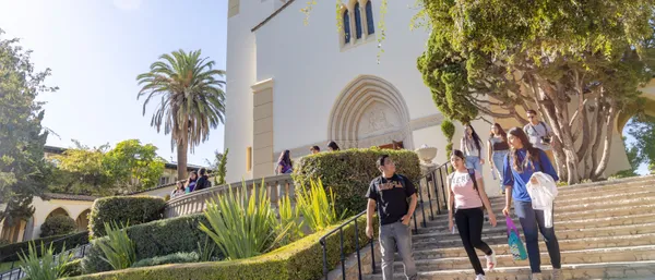 Student walking downstairs at the Chalon Campus.
