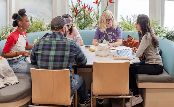 Students sitting down studying