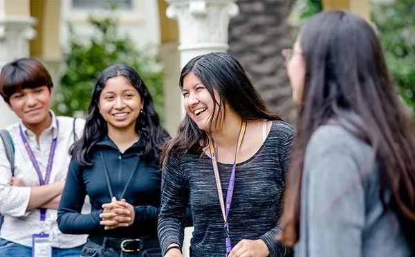 students smiling at orientation